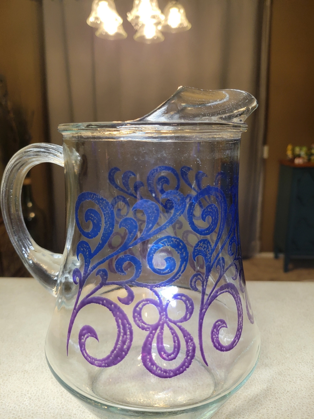 Vintage Glass Pitcher with Blue & Purple Scroll Design